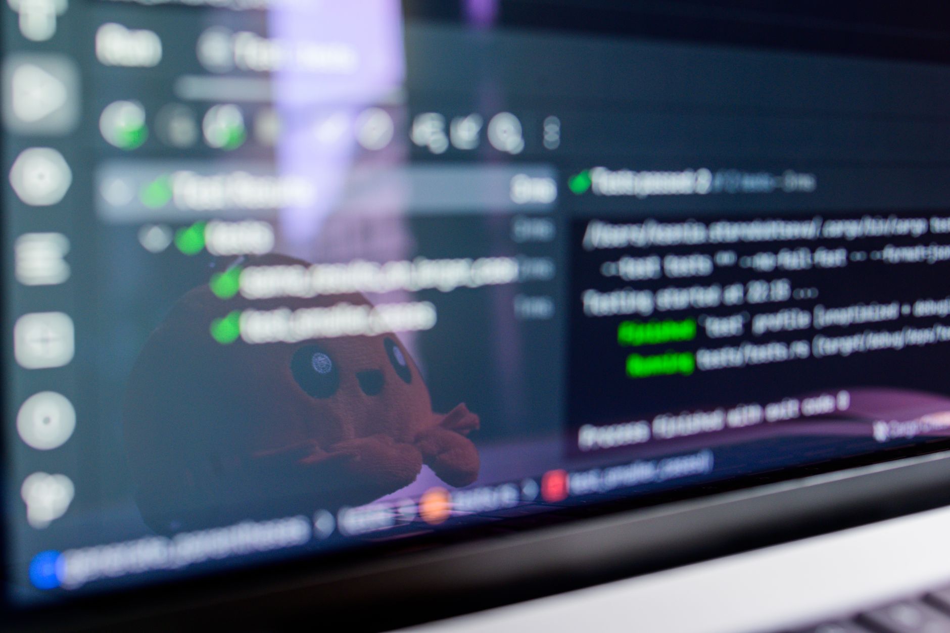 A developer writing code on a laptop, representing the programming and artificial intelligence coursework in the software development stream